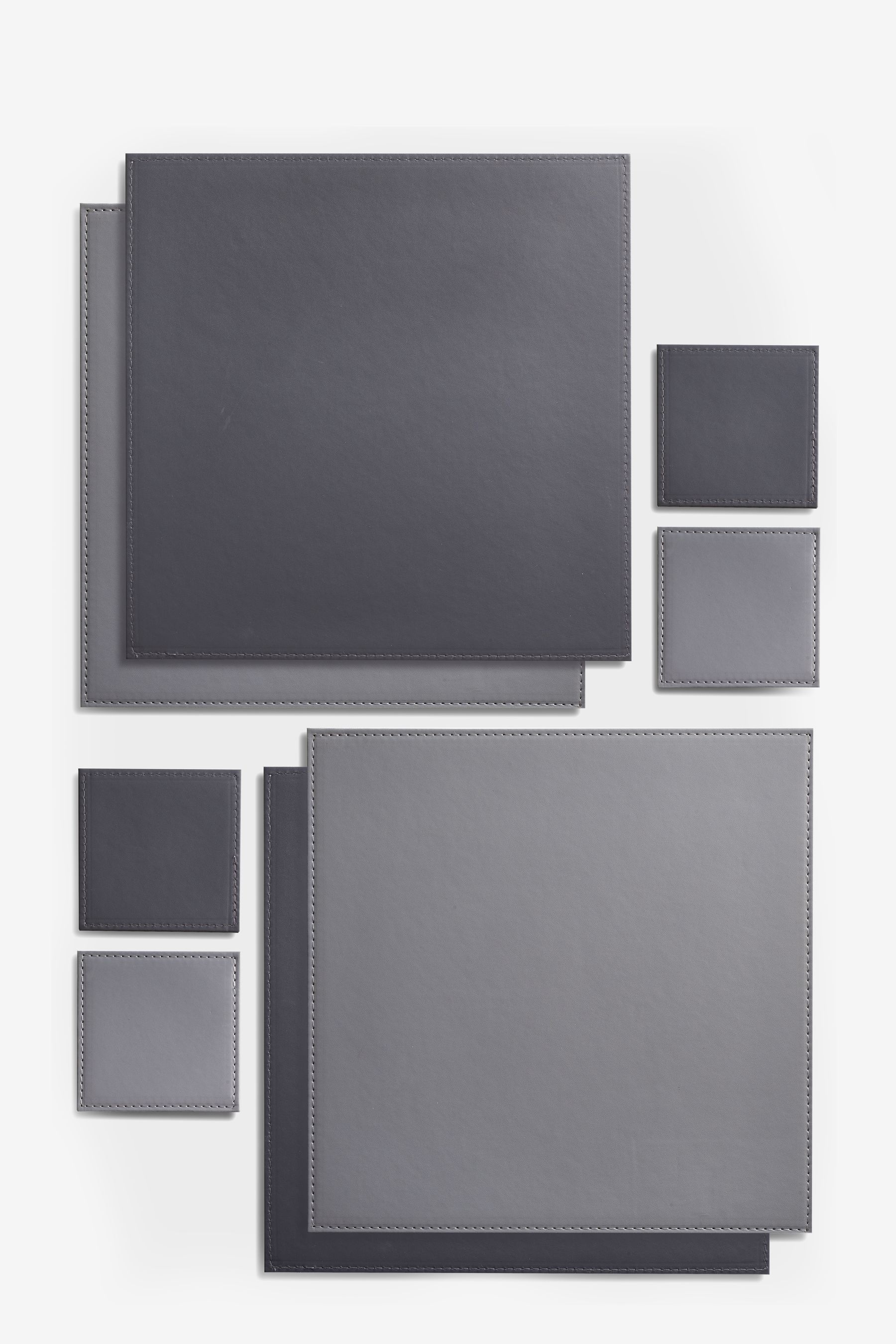 Buy 4 Reversible Faux Leather Placemats And Coasters Set from the Next
