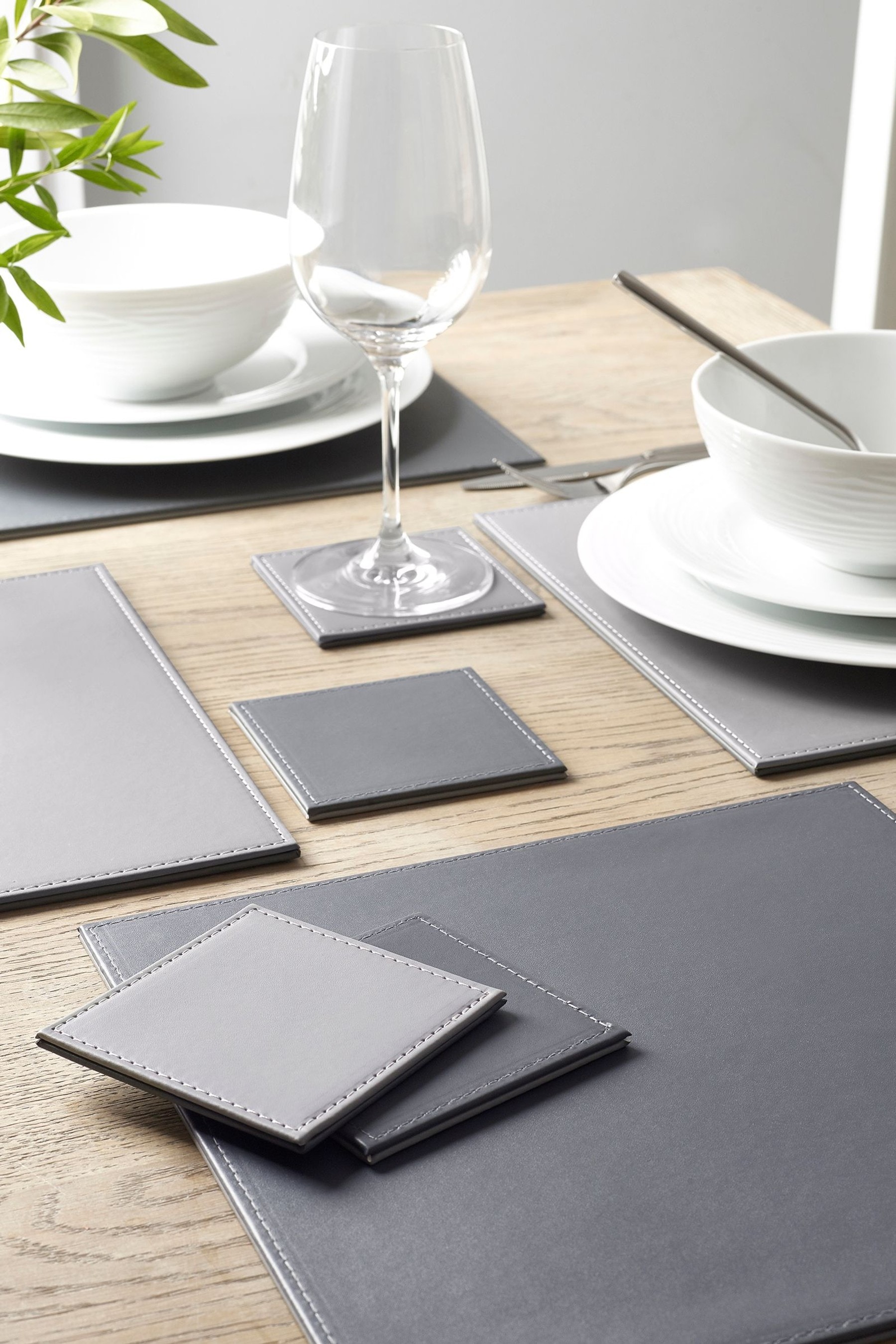 Buy 4 Reversible Faux Leather Placemats And Coasters Set from the Next
